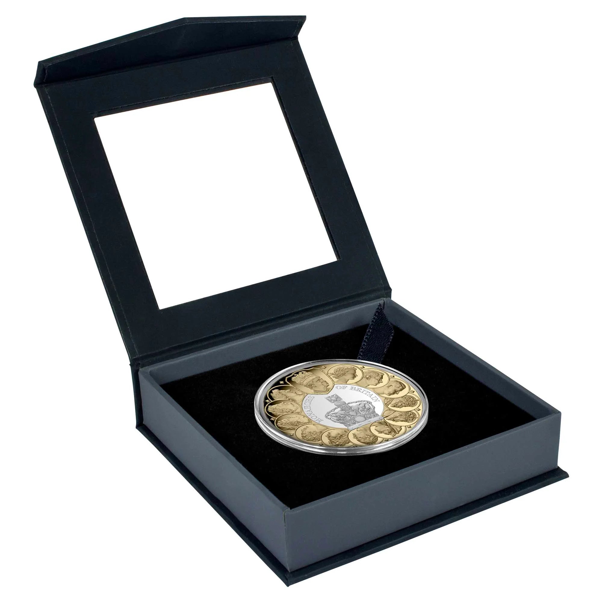 Decorative coin in a black display box on a white background