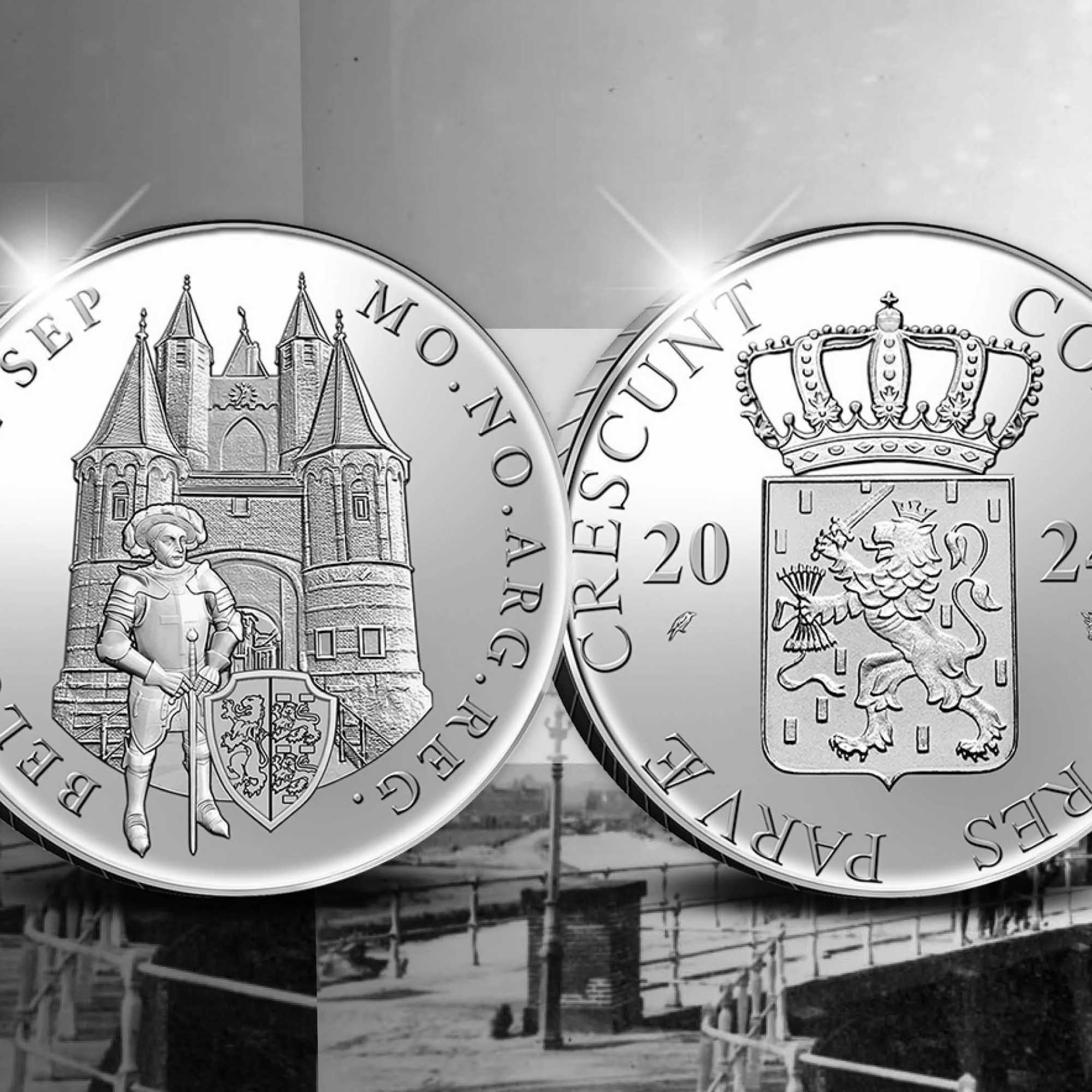 Royal Dutch Mint, two silver coins with architectural and heraldic designs on a reflective surface.