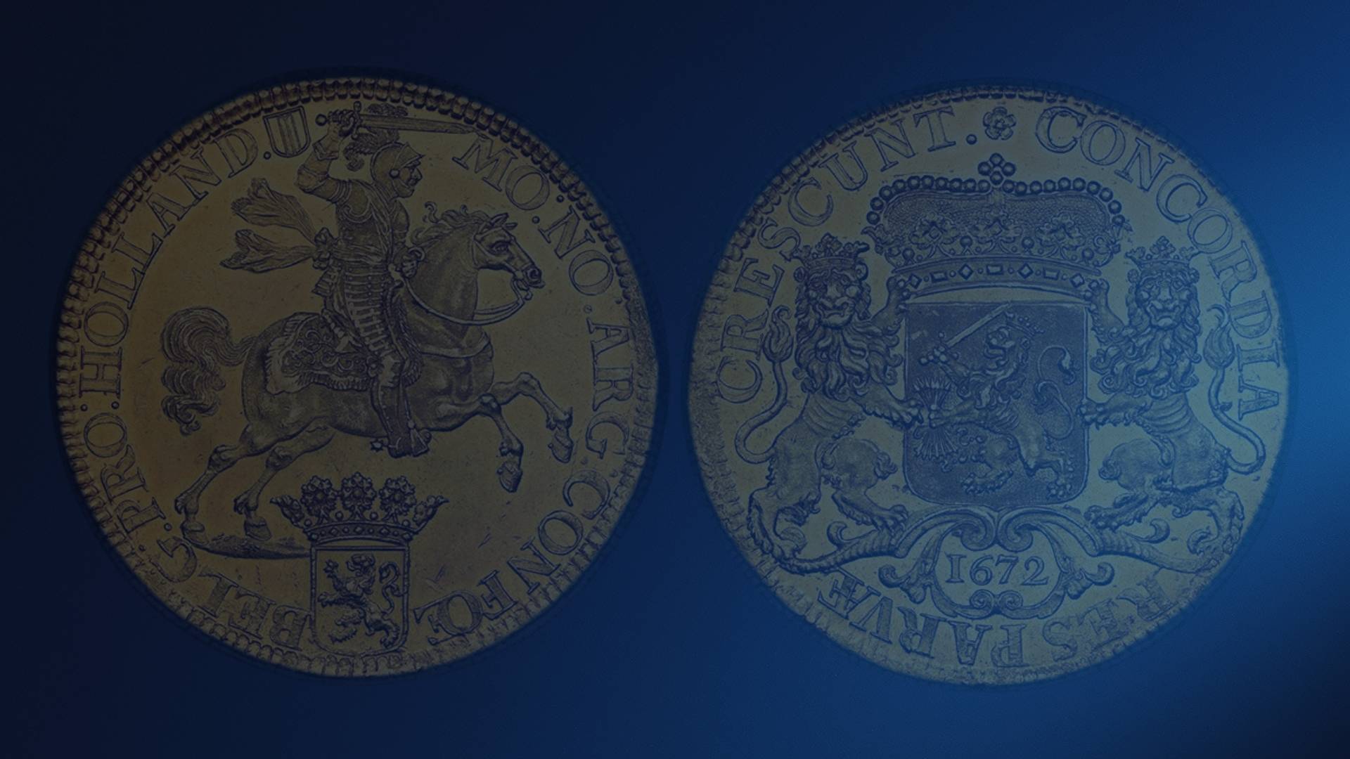 Heritage Straits Coins banner featuring two coins with detailed designs on a blue background