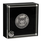Silver coin in a black display case with 'NVERAQUE VNM' inscription