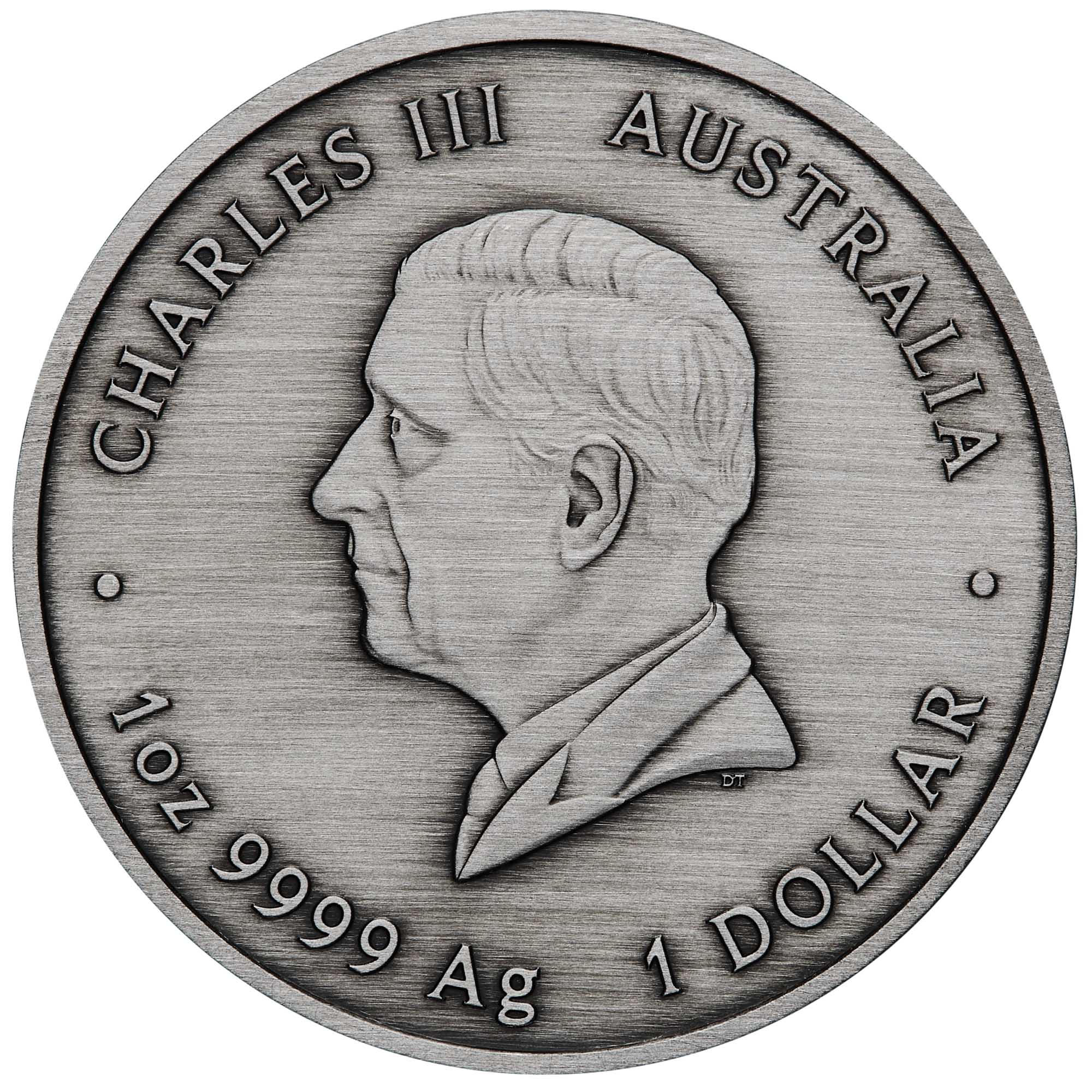 Silver coin with a profile of a person and text around it
