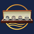 2011 Australian Commemorative Florin Silver Four-Coin Set from The Perth Mint, set of four silver coins in a wooden display case with a blue background