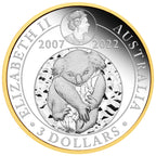 Silver and gold coin with a koala design and text around it