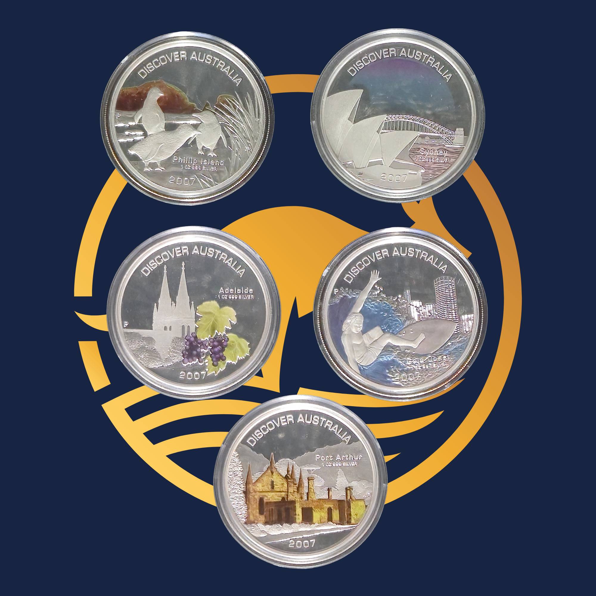 2007 set of five silver coins from the Perth Mint Discover Australia 2006-2008 series with Australian landmarks on a blue background.