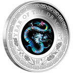 Silver coin with a dragon design and 'Year of the Dragon' text on a white background