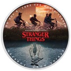 2026 Stranger Things The Upside Down one-ounce silver coloured coin from The Perth Mint, round 'Stranger Things' coin with characters on bikes and text