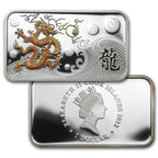 Silver coin with dragon design and engraved text on a white background