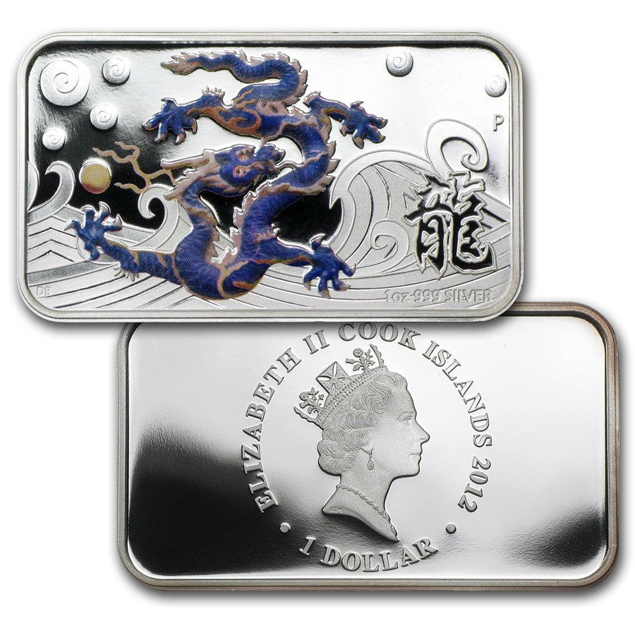 Silver bar with dragon design and engraved text on a white background
