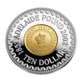 Royal Australian Mint 2002 Adelaide Pound coin with gold centre and silver rim, featuring text and a crown emblem.