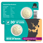 Two coins in display cards with detailed specifications on a white background