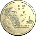 Two-dollar coin with a portrait and star design on a white background