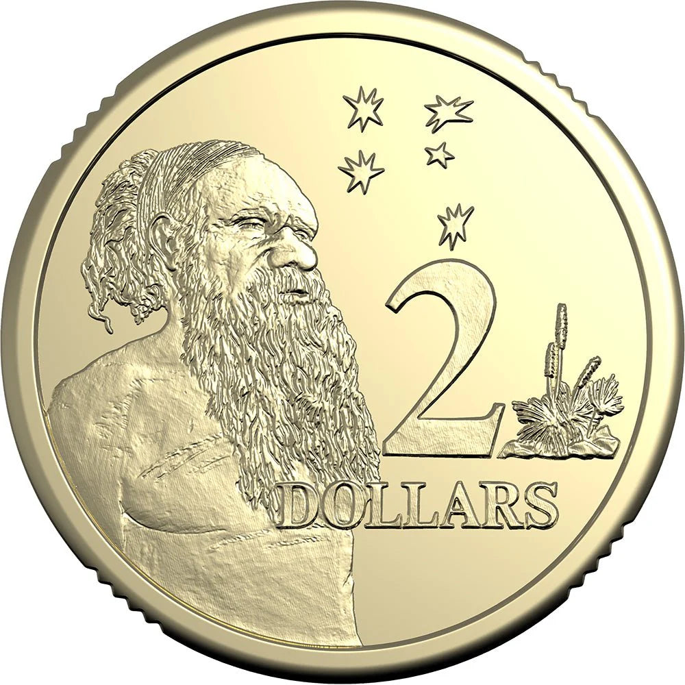 Two-dollar coin with a portrait and star design on a white background
