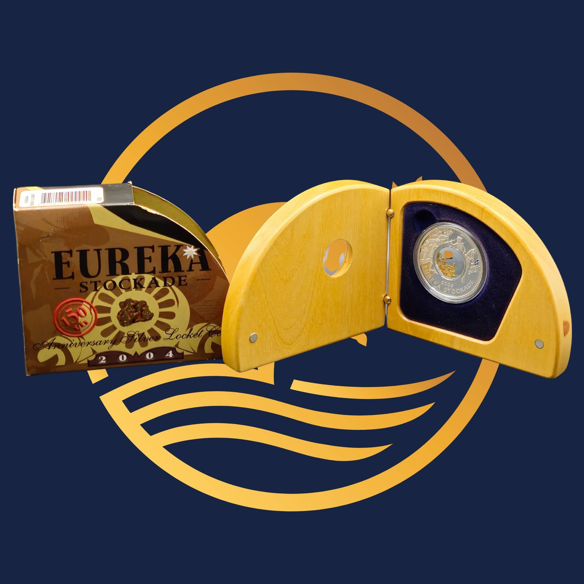Royal Australian Mint 2004 Eureka Stockade  wooden display case with a coin and packaging labelled 'Eureka Stockade' on a blue background