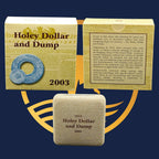 Royal Australian Mint 2003 Holey Dollar and Dump collectible set with packaging on a blue background