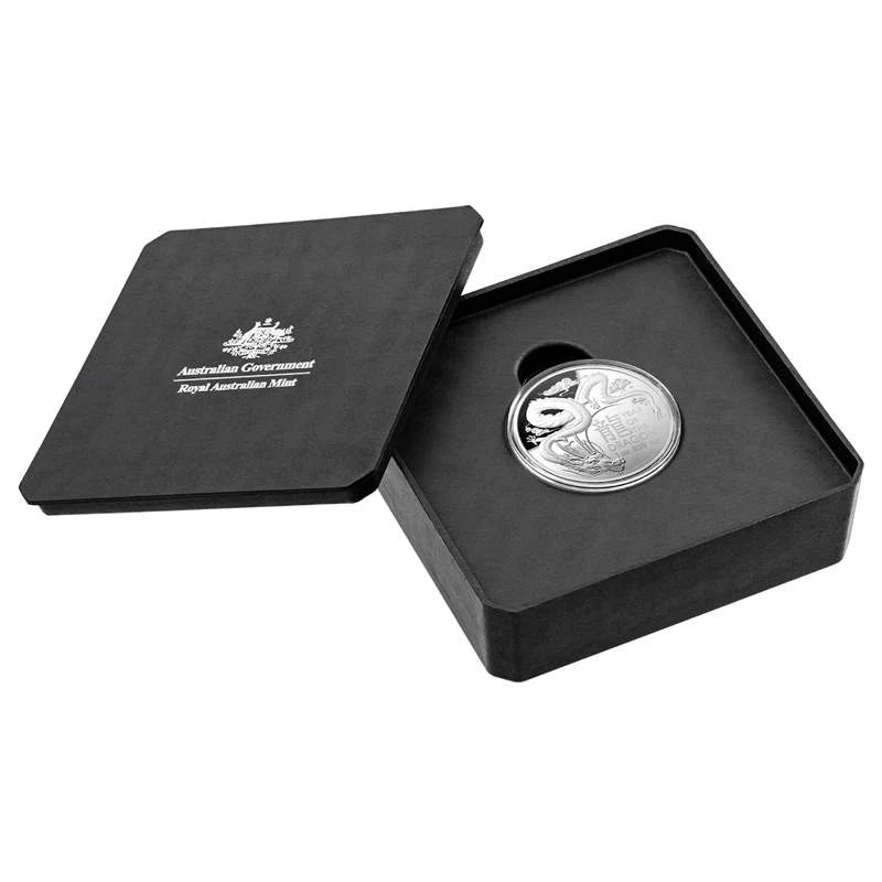 Silver coin in a black box with 'Royal Australian Mint' branding.