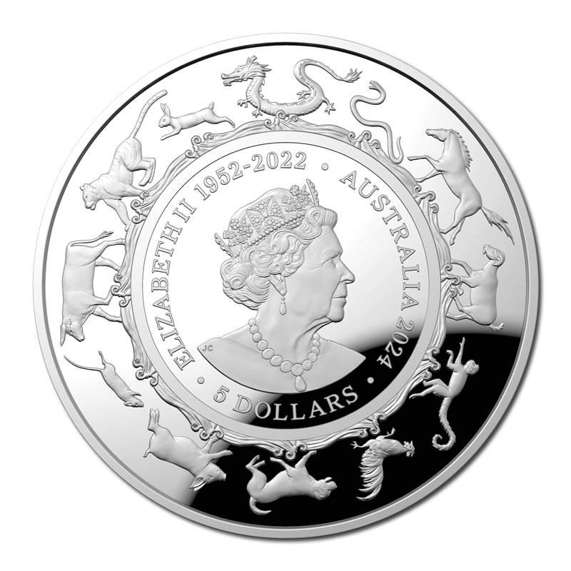 Silver coin with Queen Elizabeth II portrait and animal designs on a white background