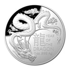 Silver coin featuring a dragon design with 'Year of the Dragon' text on a white background