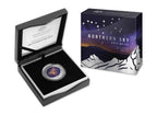 Silver coin in a display case with a certificate of authenticity, next to its packaging titled 'Northern Sky Ursa Major'.