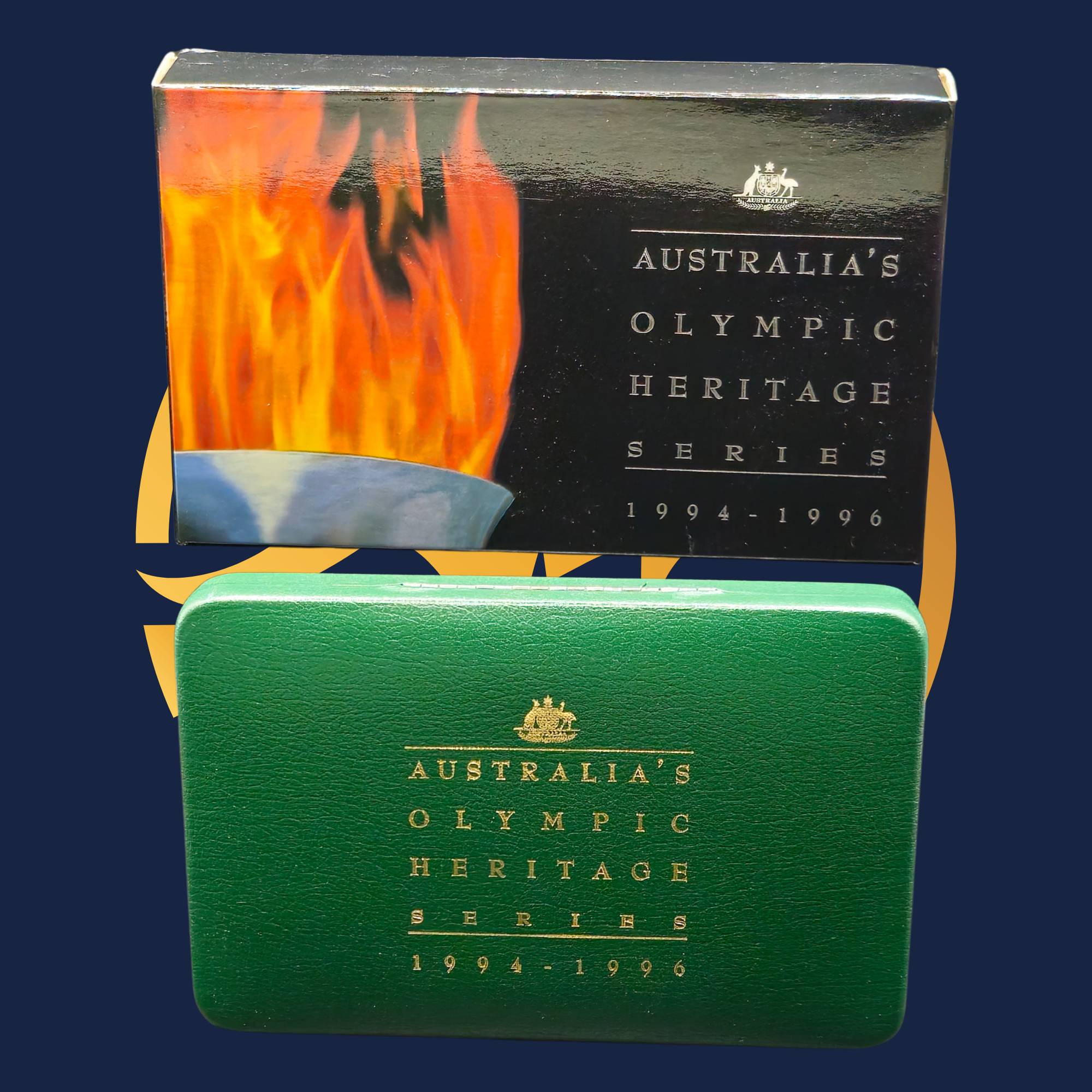 Royal Australian Mint 1994-96 green and black box with 'Australia's Olympic Heritage Series' text and flame design on a blue background